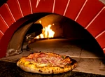 Singura pizzerie românească premiată în Europa funcționează la parterul unui cămin studențesc