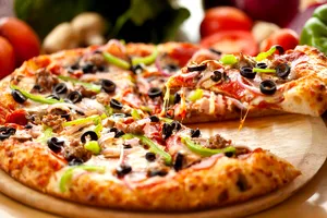 Cum se prepară pizza care nu îngrașă. Ce conține și cum o poți prepara acasă