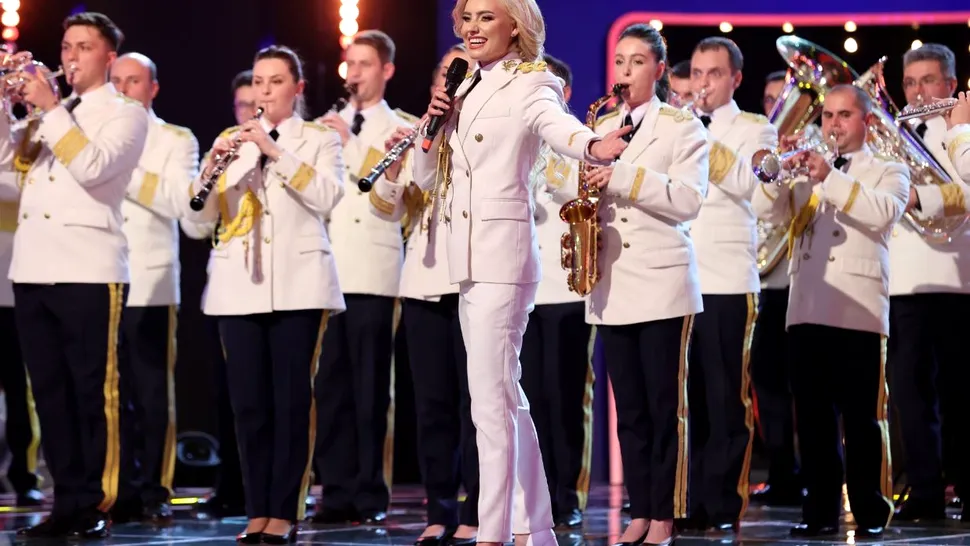 Emilia Dorobanțu, fostă ”Miss”, prima femeie din România care dirijează fanfara militară. Ce interdicții are la festivități EXCLUSIV
