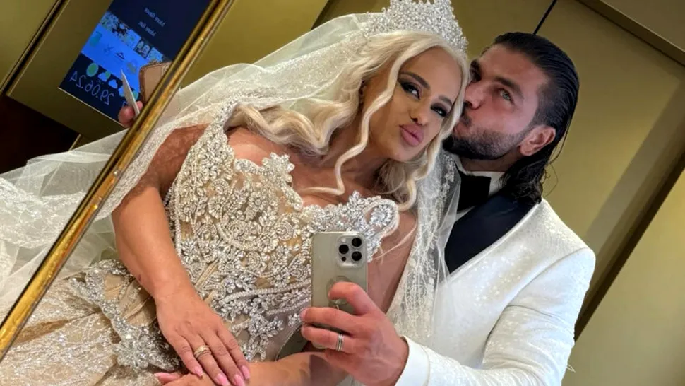 Rochia de mireasă opulentă aleasă de Anda Adam în ziua nunții. Nu a avut loc în mașină și a închiriat un autobuz FOTO
